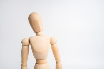 Wooden puppet tilt neck and doubt .