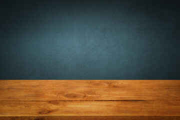 The background is blank wooden boards and a textured plastered wall with lighting and vignetting.