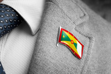 Metal badge with the flag of Grenada on a suit lapel