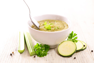 bowl of zucchini soup and spoon