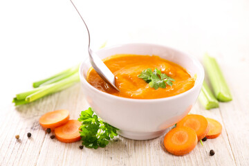 bowl of carrot soup and spoon