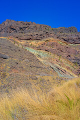 Mountains of the island of Gran Canaria, originally - this is a volcano and the landscape was formed as a result of its activity