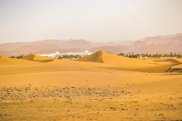 The Maspalomas Dunes are sand dunes located on the south coast of the island of Gran Canaria