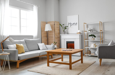 Interior of stylish living room with modern fireplace