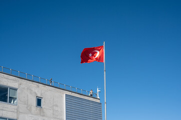 turkish flag against sky