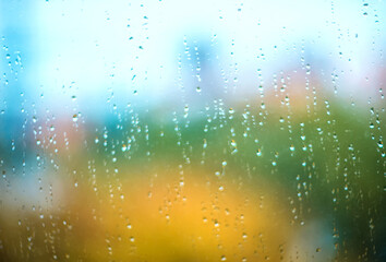 Raindrops on the window. Autumn mood