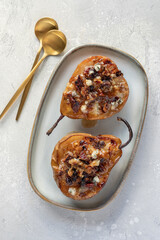 pear and cheese. pear baked with blue cheese, nuts and honey, Delicious balanced food concept. Food recipe background. Close up