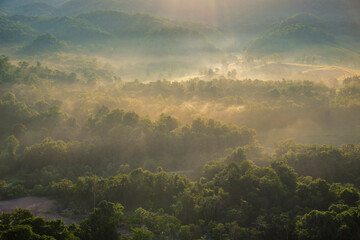 Beautiful Mountain landscape foggy windy mountain range green landscape asian farm. Amazing Landscape mountain green field meadow white cloud blue sky on sunrise. Countryside sunlight heaven scenery