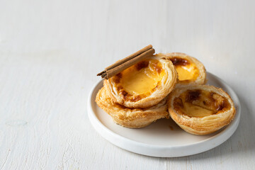 View of Pasteis de Belem a Portuguese egg custard tart pastry dusted with cinnamon.