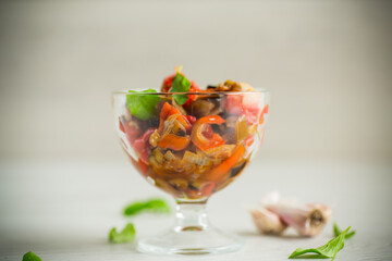 fried eggplants with peppers, tomatoes, onions and garlic