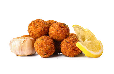 Tasty cod cutlets with lemon and garlic on white background