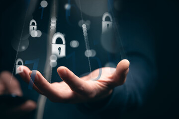 businessman holding a mobile phone with mobile security concept © ARAMYAN