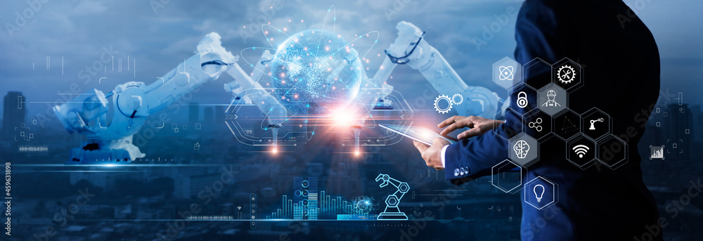 Poster Manager engineer check and control automation robot arms machine on global network and monitoring software. Innovation of robotics and digital manufacturing operation on futuristic and industry 4.0.