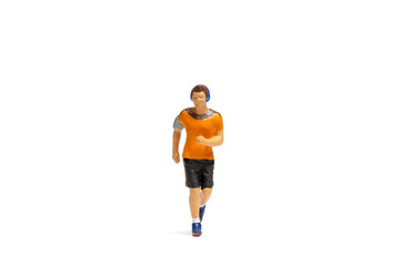 Fototapeta na wymiar Miniature people, Man in fitness wear running on white background and space for text