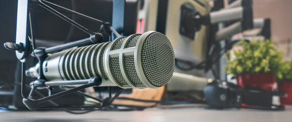 Professional Banner: microphone in radio station studio