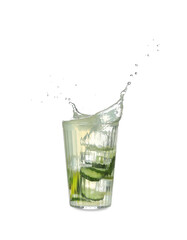 Glass of splashing lemonade on white background