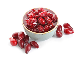Bowl of sweet dogwood jam and berries on white background