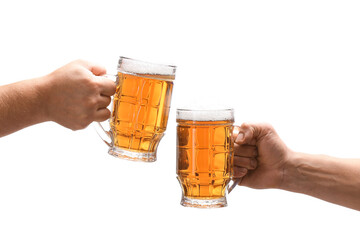 Hands with mugs of beer on white background