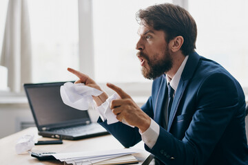 Fototapeta premium bearded man in the office at the desk career anger technologies
