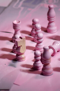 Pink painted chess pieces