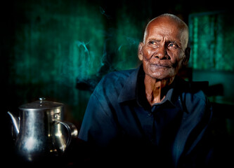 Cambodian man at a tea house