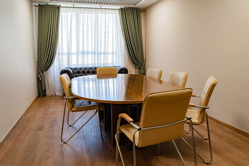 oval table in the meeting room. furniture for office and work. 