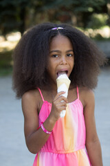 cute mixed girl eating an ice cream