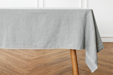 Fototapeta na wymiar Minimal tablecloth on a table in a dining room