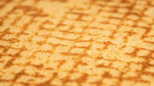 Pancake Texture Rotating Background. Fried Slapjack With Print of Frying Pan. Morning Food Concept