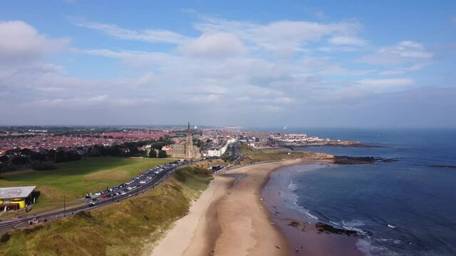 Aerial Shot of Tynemouth Long Sands Beach on a Warm Summer Day - Drone 4K HD Footage Backwards