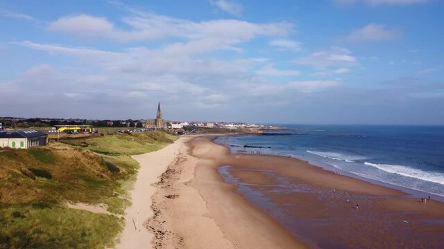 Aerial Shot of Tynemouth Long Sands Beach on a Warm Summer Day - Drone 4K HD Footage Rise Up