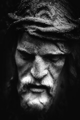 Antique statue of suffering of Jesus Christ crown of thorns. Black and white image. Fragment. Close...