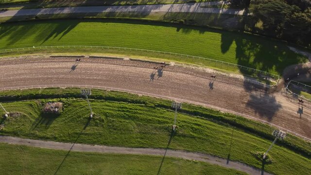 Aerial top down shot of warm up round during horse race competition in San Isidro,Argentina