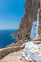 The famous Hozoviotissa Monastery standing on a rock over the Aegean sea in Amorgos island,...
