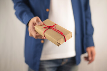 Person holding gift box, new year gift box, Christmas gift box ,copy space. Christmas, hew year, birthday concept.