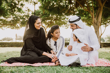 Happy family spending time together outdoor in Dubai