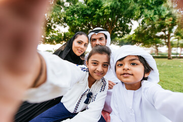 Happy family spending time together outdoor in Dubai