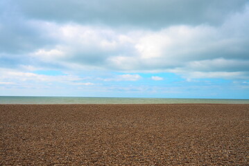 Fototapeta na wymiar View to the sea from pebbles beach.