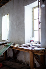 abandoned workshop with window to the outside