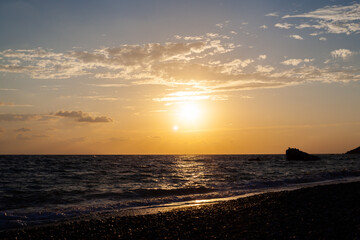 sunset at aphrodite beach in cyprus