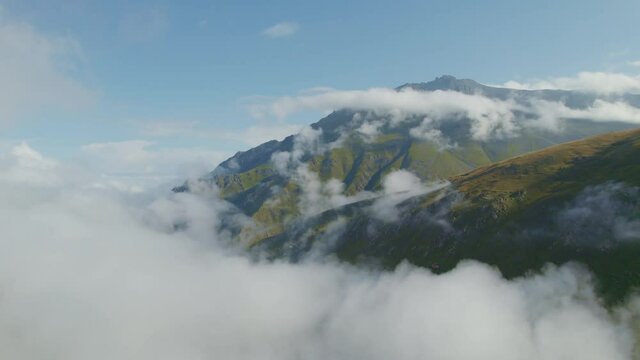 foggy mountain morning, flying over mountain peaks through the clouds, peaceful natural landscape, Turkey, Kackar mountains