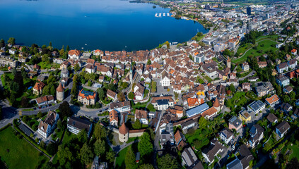 Aerial view around the old town of the city Zug in Switzerland on a sunny day in summer.