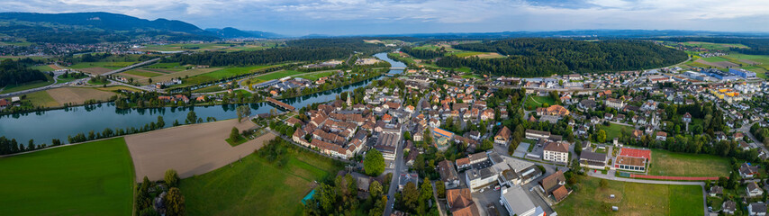 Fototapeta na wymiar Aerial view around the old town of the city Wangen an der Aare in Switzerland on a late afternoon in summer.