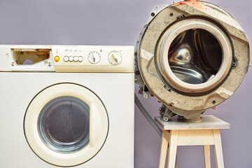 disassembled washing machine and drum