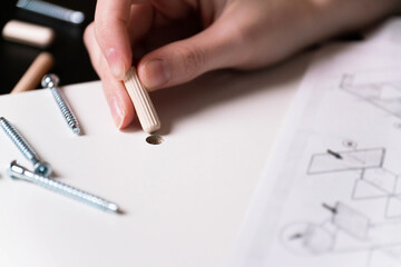 The process of assembling modular furniture using various