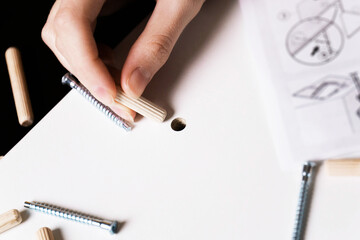 The process of assembling modular furniture using various