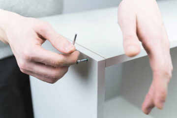 The process of assembling modular furniture using various