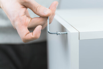 The process of assembling modular furniture using various