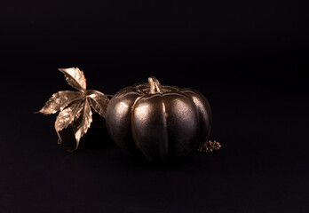Gold and black luxury pumpkin. Minimalist banner good for thanksgiving and Halloween.