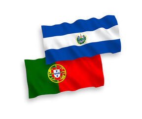 National vector fabric wave flags of Portugal and Republic of El Salvador isolated on white background. 1 to 2 proportion.